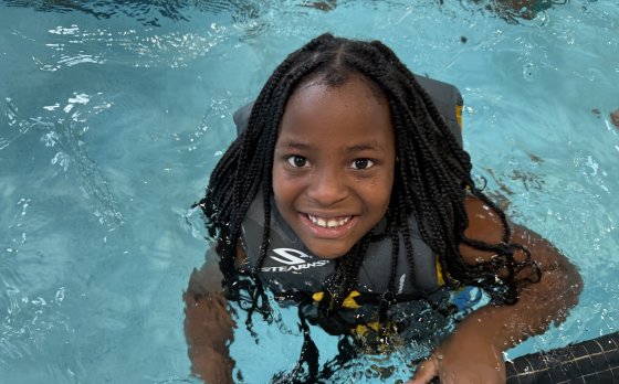 Kid Swimming at Camp Thunderbird
